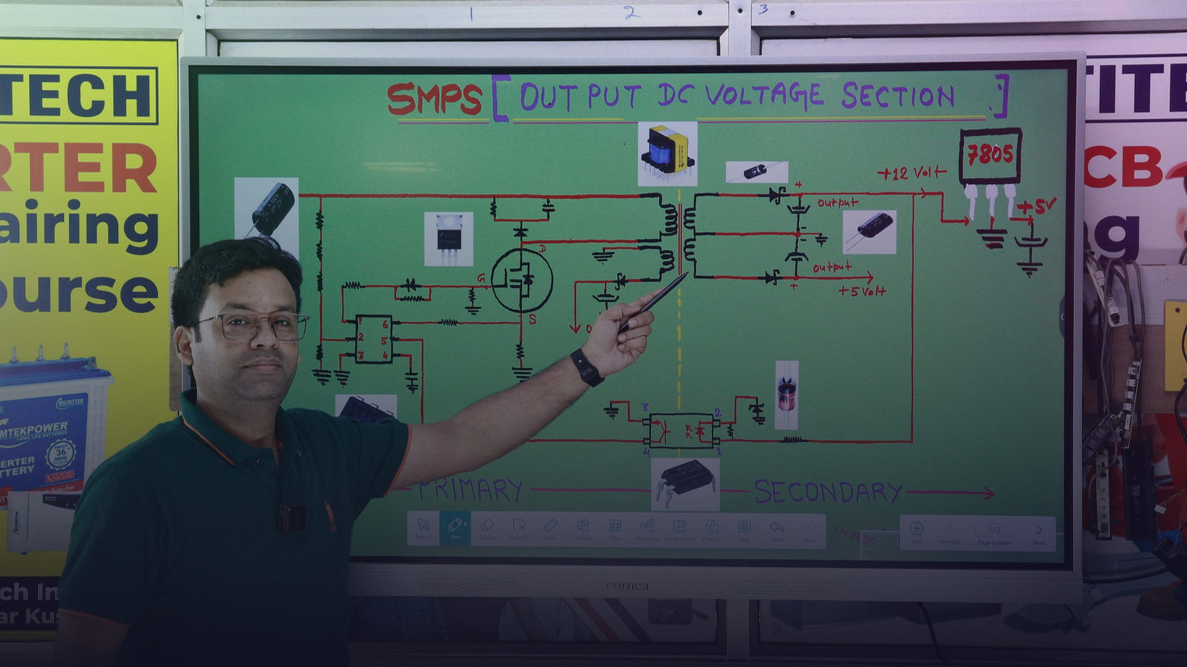 A trainer explains a technical circuit diagram on a digital whiteboard.